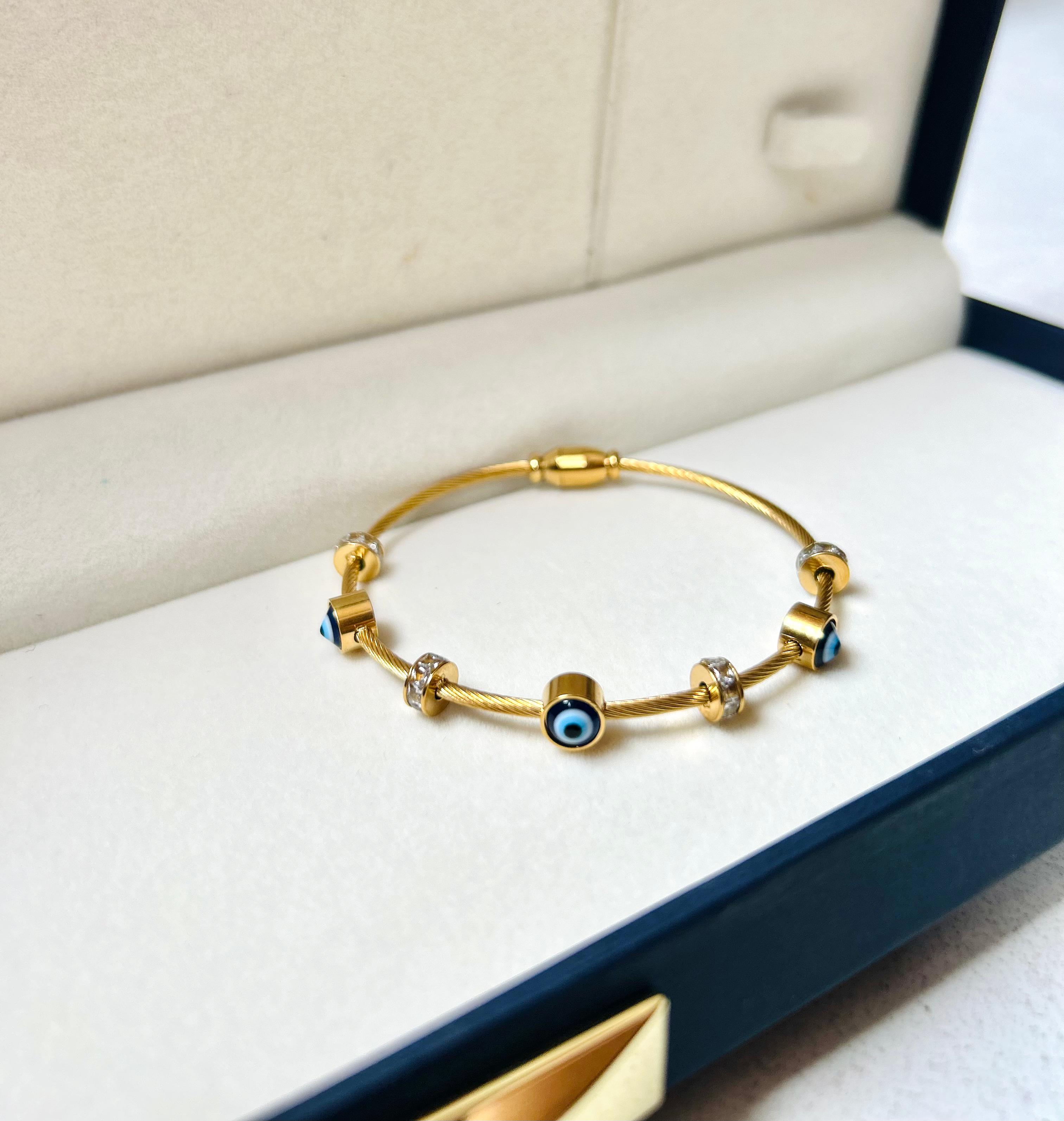 Gold Evil Eye Charm Bracelet – Protection & Elegance