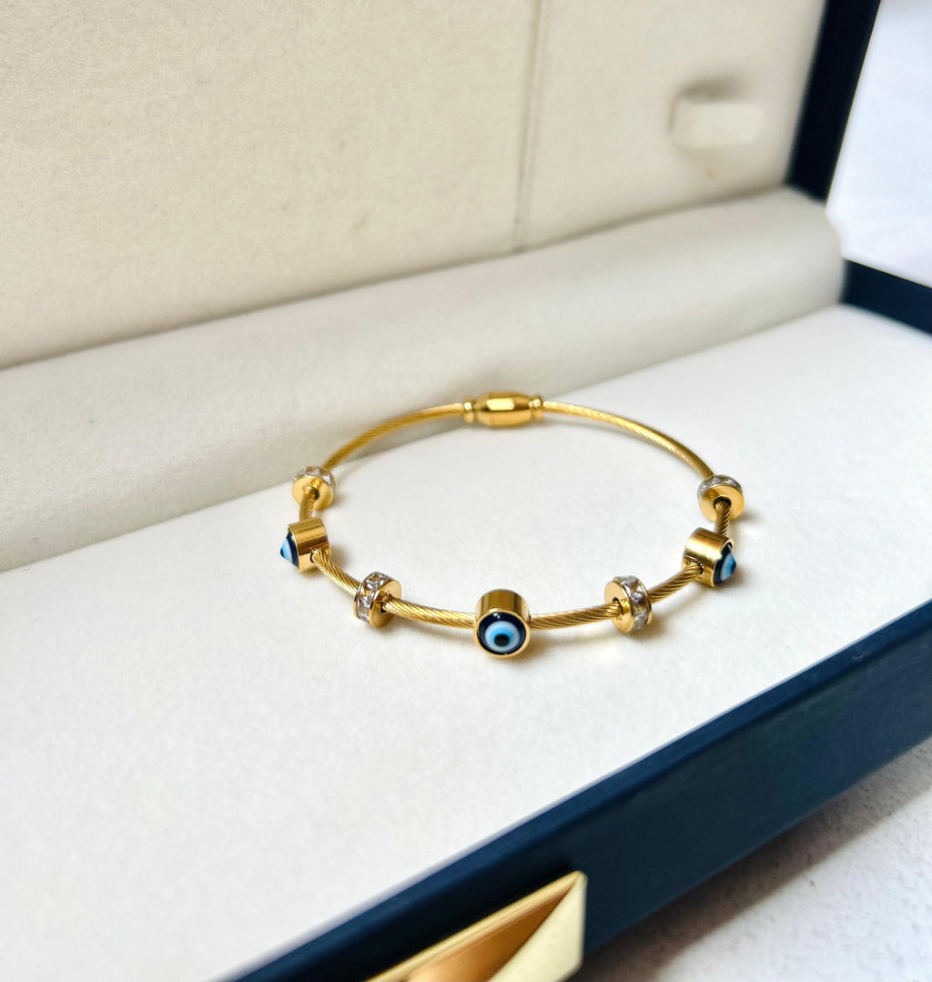 Gold Evil Eye Charm Bracelet – Protection & Elegance